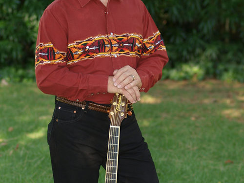 Jim Curry performs John Denver songs at Westminster High School