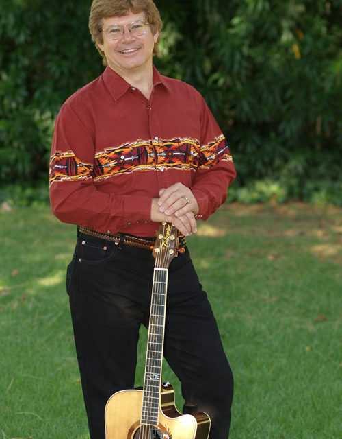 Jim Curry performs John Denver songs at Westminster High School